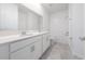 Bright bathroom features double vanity sinks and a bath tub with shower at 6452 Sprucepine Ln, St Cloud, FL 34771