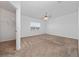 Bright bedroom featuring plush carpet, ceiling fan, and a closet at 6452 Sprucepine Ln, St Cloud, FL 34771
