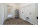 Large laundry room with utility sink connections and exterior access to rear of home at 6452 Sprucepine Ln, St Cloud, FL 34771