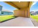Covered back patio with exterior storage perfect for outdoor relaxation or entertainment at 6452 Sprucepine Ln, St Cloud, FL 34771