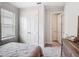 This bedroom boasts bright natural light and features plenty of closet space at 684 San Augusto Dr, Poinciana, FL 34759