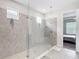 Modern bathroom featuring large glass shower and tile surround at 684 San Augusto Dr, Poinciana, FL 34759