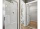 Contemporary bathroom featuring a glass-enclosed shower and stylish tile work at 725 Lake Dell Rd, Dundee, FL 33838