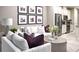 Cozy living room with a comfortable sofa, stylish decor, and an open floor plan at 730 Lake Dell Rd, Dundee, FL 33838