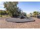 Community playground with slides, climbing structure, and rubber mulch surfacing at 740 Madison Dr, Davenport, FL 33837
