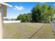 Expansive backyard featuring a mix of lush greenery and open space, ideal for recreation at 7431 Sw 129Th Pl, Ocala, FL 34473