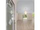 Bright foyer leads to a spacious living area with new floors and natural light at 7431 Sw 129Th Pl, Ocala, FL 34473