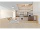 Practical kitchen layout with plenty of counter space, updated appliances, and a convenient breakfast bar at 7431 Sw 129Th Pl, Ocala, FL 34473