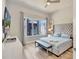 Cozy bedroom with a large window, comfortable bed, and modern decor at 7740 Sandy Ridge Dr # 236, Reunion, FL 34747