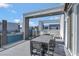 Modern patio featuring a dining set and sleek design, offering an inviting outdoor space for relaxation and entertaining at 7740 Sandy Ridge Dr # 236, Reunion, FL 34747
