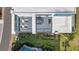 Modern roof deck with dining table, outdoor kitchen, lounge seating, and room to relax and enjoy your beautiful surroundings at 7740 Sandy Ridge Dr # 236, Reunion, FL 34747