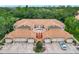 A birds eye view showcases the multiple condos and garages in this development at 7806 Sugar Brook Ct # 7806, Orlando, FL 32819