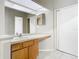 A light and bright bathroom offers a vanity and toilet at 7806 Sugar Brook Ct # 7806, Orlando, FL 32819