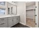 Bathroom boasts a single sink, and a large mirror at 7878 Greengard St, Orlando, FL 32827
