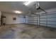 Spacious two-car garage featuring ample storage space and a functional layout at 7878 Greengard St, Orlando, FL 32827