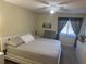 Bright bedroom featuring a comfortable bed, natural light, and a calming atmosphere at 8 Buck Cir # 8, Haines City, FL 33844