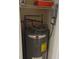 Utility closet featuring a Rheem water heater at 8 Buck Cir # 8, Haines City, FL 33844