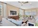 Inviting living room with a comfortable sofa, modern furnishings, and an adjacent dining area at 808 Wekiva Ridge Dr, Mount Dora, FL 32757