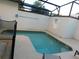Private pool offers a relaxing escape with a fenced surround and clear, inviting water at 9079 Dogleg Dr, Davenport, FL 33896