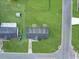 Aerial view of home showcases roof, yard, and neighborhood streets at 98 Pinata Ct, Kissimmee, FL 34743