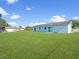 Expansive backyard provides ample space with well-maintained lawn at 98 Pinata Ct, Kissimmee, FL 34743