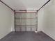 Spacious one-car garage with an automatic door at 98 Pinata Ct, Kissimmee, FL 34743