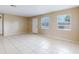 Spacious living room with tile flooring and natural light at 98 Pinata Ct, Kissimmee, FL 34743