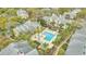 Aerial view of a community with a swimming pool, landscaping, and residential buildings at 1065 S Hiawassee Rd # 1425, Orlando, FL 32835