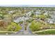 Broad aerial view of a well-maintained apartment complex with mature landscaping and ample parking at 1065 S Hiawassee Rd # 1425, Orlando, FL 32835