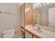 Bathroom featuring a vanity with a white countertop, wood cabinets, and a mirror at 1065 S Hiawassee Rd # 1425, Orlando, FL 32835
