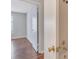 Bathroom and bedroom featuring a walk-in shower and wood floors at 1065 S Hiawassee Rd # 1425, Orlando, FL 32835