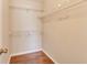 Walk-in closet with wood flooring and wire shelving at 1065 S Hiawassee Rd # 1425, Orlando, FL 32835