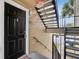 Front door with stairs and landscaping at 1065 S Hiawassee Rd # 1425, Orlando, FL 32835
