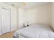 Bedroom featuring a full size bed, a desk and a closet at 115 Anzio Dr, Kissimmee, FL 34758