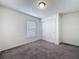 Carpeted bedroom with a window and a closet with a bi-fold door at 119 Summerlin Loop, Haines City, FL 33844