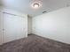 Neutral bedroom has carpet, a window and closet with double doors at 119 Summerlin Loop, Haines City, FL 33844
