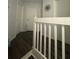 A well-lit upstairs hallway with wood floors and white doors leading to various rooms at 1211 Carey Glen Cir, Orlando, FL 32824