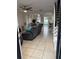 Inviting living room with tile floors, neutral paint, ceiling fan, and an open layout at 1211 Carey Glen Cir, Orlando, FL 32824