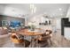Bright dining area connects to the kitchen and living room for easy entertaining at 13044 Lakeshore Grove Dr, Winter Garden, FL 34787