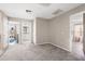 Upstairs hallway leading to bedrooms, bathroom, and a bonus room at 13044 Lakeshore Grove Dr, Winter Garden, FL 34787