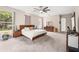 Large main bedroom with a ceiling fan and windows at 13044 Lakeshore Grove Dr, Winter Garden, FL 34787