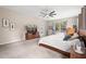 Well-lit main bedroom featuring a ceiling fan, and neutral tones at 13044 Lakeshore Grove Dr, Winter Garden, FL 34787
