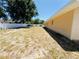 Wide backyard with a privacy fence and outdoor patio at 1419 Avenue D Ne, Winter Haven, FL 33881