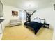 Spacious bedroom featuring neutral-colored walls, carpet flooring, and ample space for relaxation and personalization at 1419 Avenue D Ne, Winter Haven, FL 33881