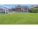 Spacious backyard with a screened-in pool, perfect for outdoor activities at 147 Bridgewater Dr, Davenport, FL 33897