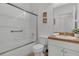 Bathroom featuring a shower-tub combo, a single sink vanity, tile floors, and a new toilet at 147 Bridgewater Dr, Davenport, FL 33897