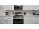 Close-up of a well-equipped kitchen with stainless steel appliances and ample counter space at 147 Bridgewater Dr, Davenport, FL 33897