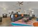 Spacious living room with an open layout connecting to the kitchen and dining areas at 147 Bridgewater Dr, Davenport, FL 33897