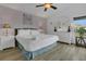 Serene main bedroom with soft colors, comfortable furnishings, and plenty of natural light at 147 Bridgewater Dr, Davenport, FL 33897