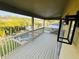 Covered balcony overlooking the manicured backyard and pool at 14963 Yorkshire Run Dr, Orlando, FL 32828